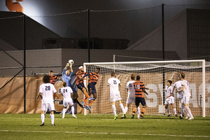 A Syracuse corner is sniffed out by an opposing goalkeeper.