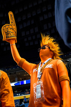 A Syracuse fan decked out in all Orange apparel.