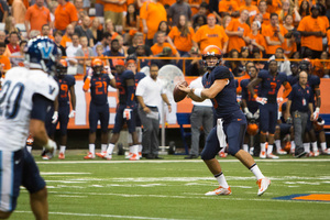 Redshirt freshman Austin Wilson was thrown into the game following Terrel Hunt's ejection. The backup quarterback completed 11 out of his 17 passes in the Orange's 27-26 win.