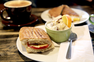 Many of Mello Velo’s menu items are inspired by biking. The Yellow Jersey, a reference to the leader of the Tour de France, is a warm breakfast sandwich filled with apples, bananas, honey, cinnamon and peanut butter. 