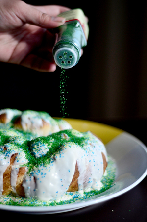 King cake, a staple Mardi Gras or Fat Tuesday cuisine, is topped with cream cheese frosting and colorful sanding sugar. Mardi Gras is celebrated all over the world. In the United States, New Orleans has one of the largest citywide Mardi Gras celebrations, with parades and elaborate festivities.       