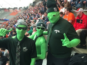 (From left) Tony Golumbeck, Kevin Golumbeck and Ron Golumbeck pose for a photo at the Carrier Dome Sunday, where Michigan State defeated Louisville to advance to the Final Four.