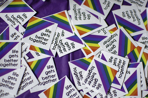 Stickers from a Life Gets Better Together conference, which covered issues with LGBT youth advocacy.