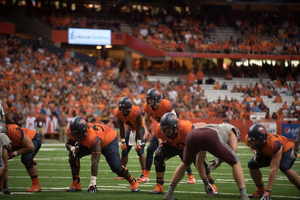 Syracuse will go up against a Louisville front seven that features three players named to the preseason All-Atlantic Coast Conference team.