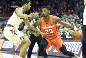 Frank Howard drilled a clutch 3-pointer late in the game, spurring a UofL fan to holler 