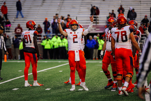 Eric Dungey syphons the crowd in SU's win over Boston College in its final regular-season game.