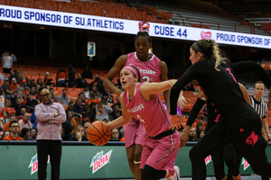 Tiana Mangakahia, pictured last season against Louisville in the Carrier Dome, is on SU's side of an elite-guard matchup with UofL's Asia Durr. 