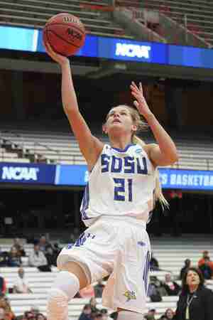 Tylee Irwin drives to the hoop in SDSU's opening-round win over Quinnipiac.