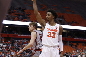 Elijah Hughes (21 points) and Buddy Boeheim (22) paced the Orange offense on Saturday in the Carrier Dome. 