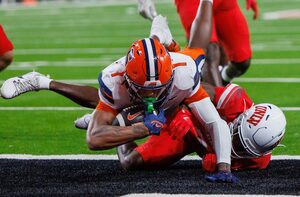 Syracuse came from behind to upset No. 25 UNLV 44-41 in overtime. A Fadil Diggs sack and a LeQuint Allen Jr. (pictured) touchdown sealed the win.