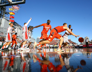 Brandon Triche of the Syracuse Orange reaches for the ball during the game against the San Diego State Aztecs during the Battle on the Midway game on Sunday.