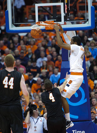 Syracuse forward James Southerland slams home a dunk.