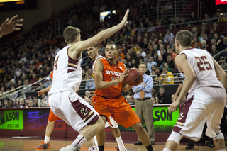 Tyler Ennis looks for an opening in the Eagles' defense. Ennis finished with five assists and just one turnover. 