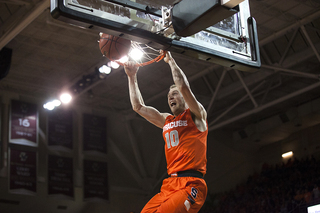 Trevor Cooney throws down one of his first-half dunks. Cooney finished with a game-high 21 points and came through with some big plays in the second half. 