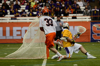 Scott Loy goes for a shot past Albany goalie Blaze Riordan. 