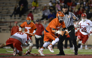 Chris Daddio bursts out of a clean faceoff win.  