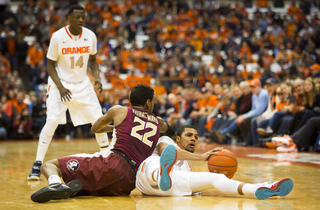 Gbinije falls to the ground after attempting a play late in the second half.