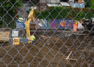 Some graffiti still remains from when Syracuse favorites such as Hungry Chuck's and Funk 'n Waffles still stood on South Crouse Avenue. Photo taken July 25, 2017