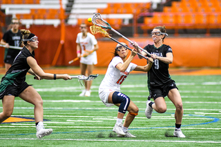 Natalie Wallon battles for the ball of the draw. 