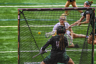 Loyola goaltender Kady Glynn (44) stepped up making seven saves in the second half of play.