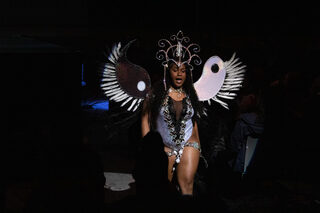 Woodley struts the stage in feathers, ribbons and sparkles. The second section of the pageant was Carnival wear, in which contestants showed off a diversity of bright Caribbean Carnival costumes.